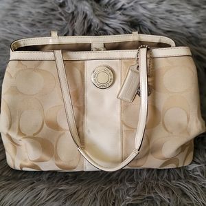 Signature coach bag